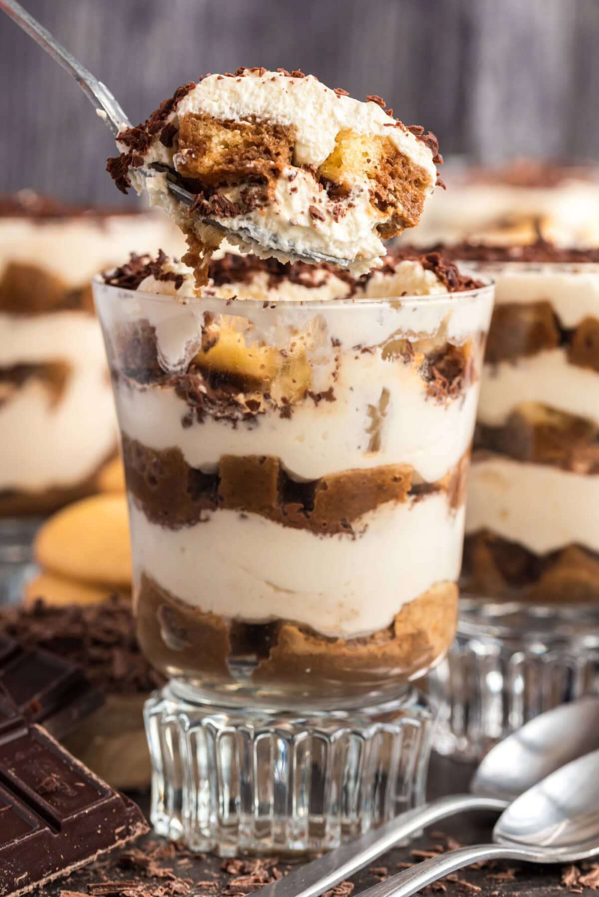 Spoonful of Bailey's Tiramisu Parfait being lifted out of the parfait cup