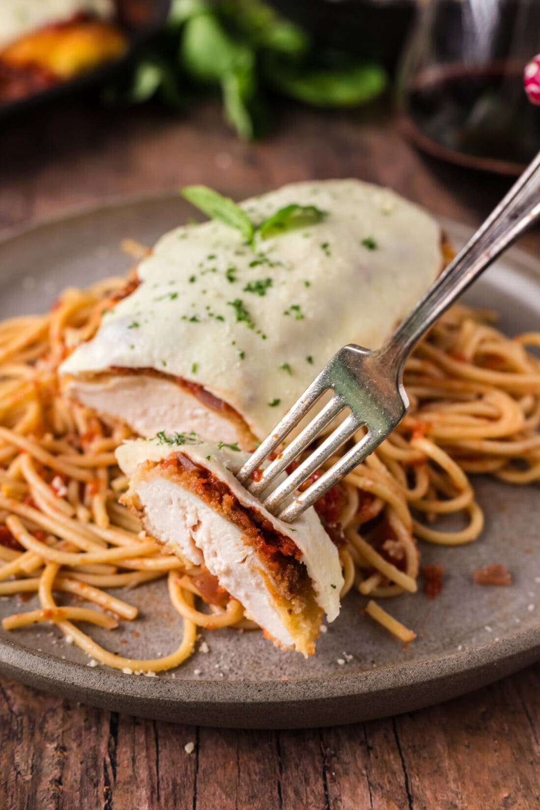 Piece of Chicken Parmesan on a fork