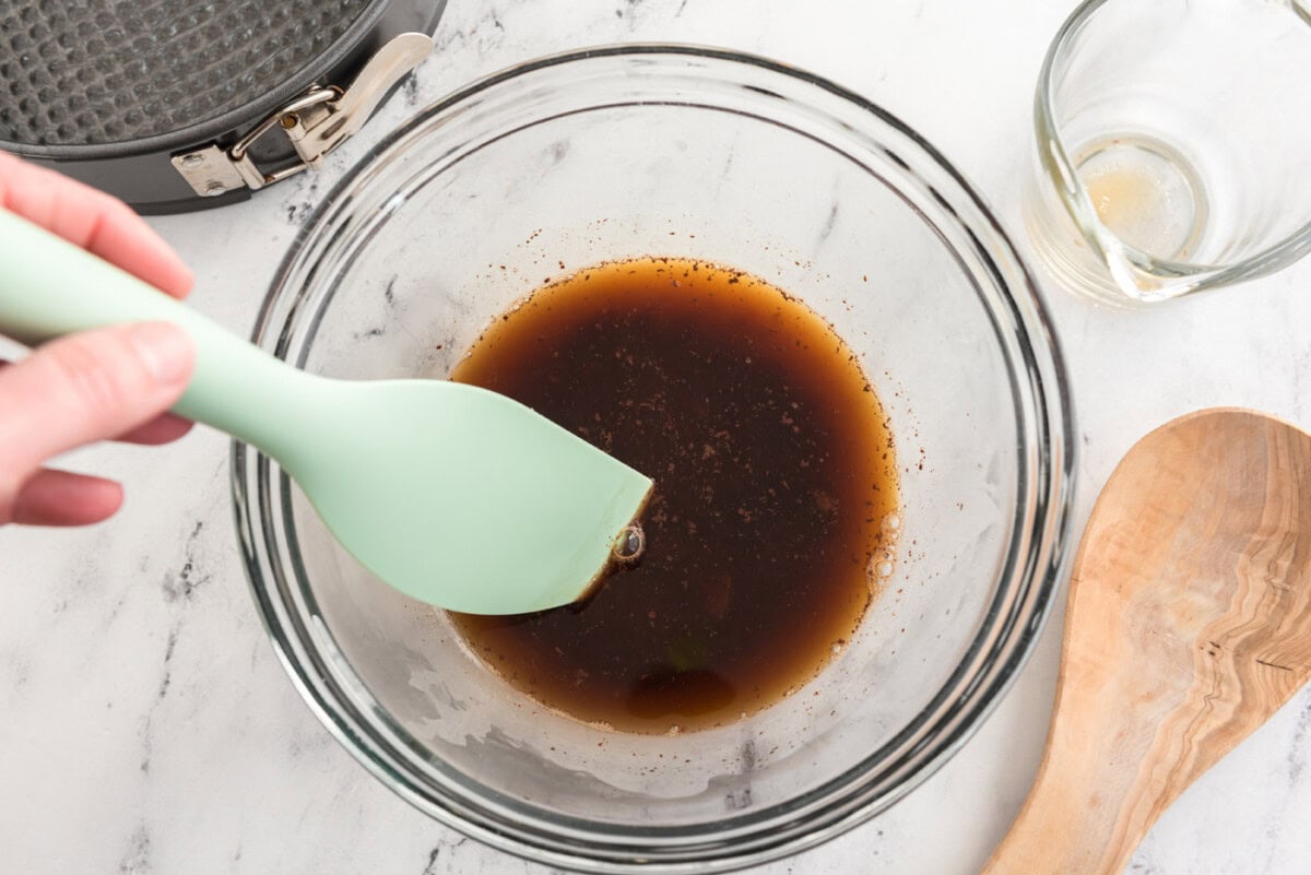 Melting chocolate in a bowl of hot coffee