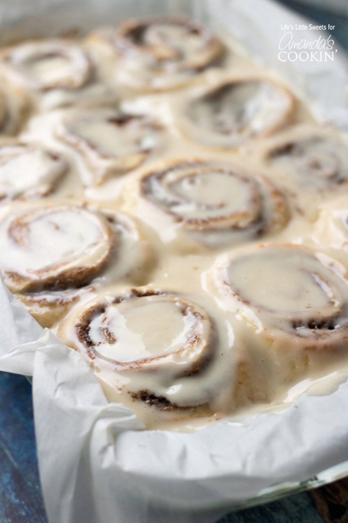 These Homemade Cinnamon Rolls are a true classic. Topped with cream cheese frosting, these gooey cinnamon rolls satisfy your sweet craving! They also make the perfect holiday morning breakfast with the family. #breakfast #cinnamonrolls #breadrecipes #holidaybreakfast #dough #cinnamon Homemade Cinnamon Rolls in a pan