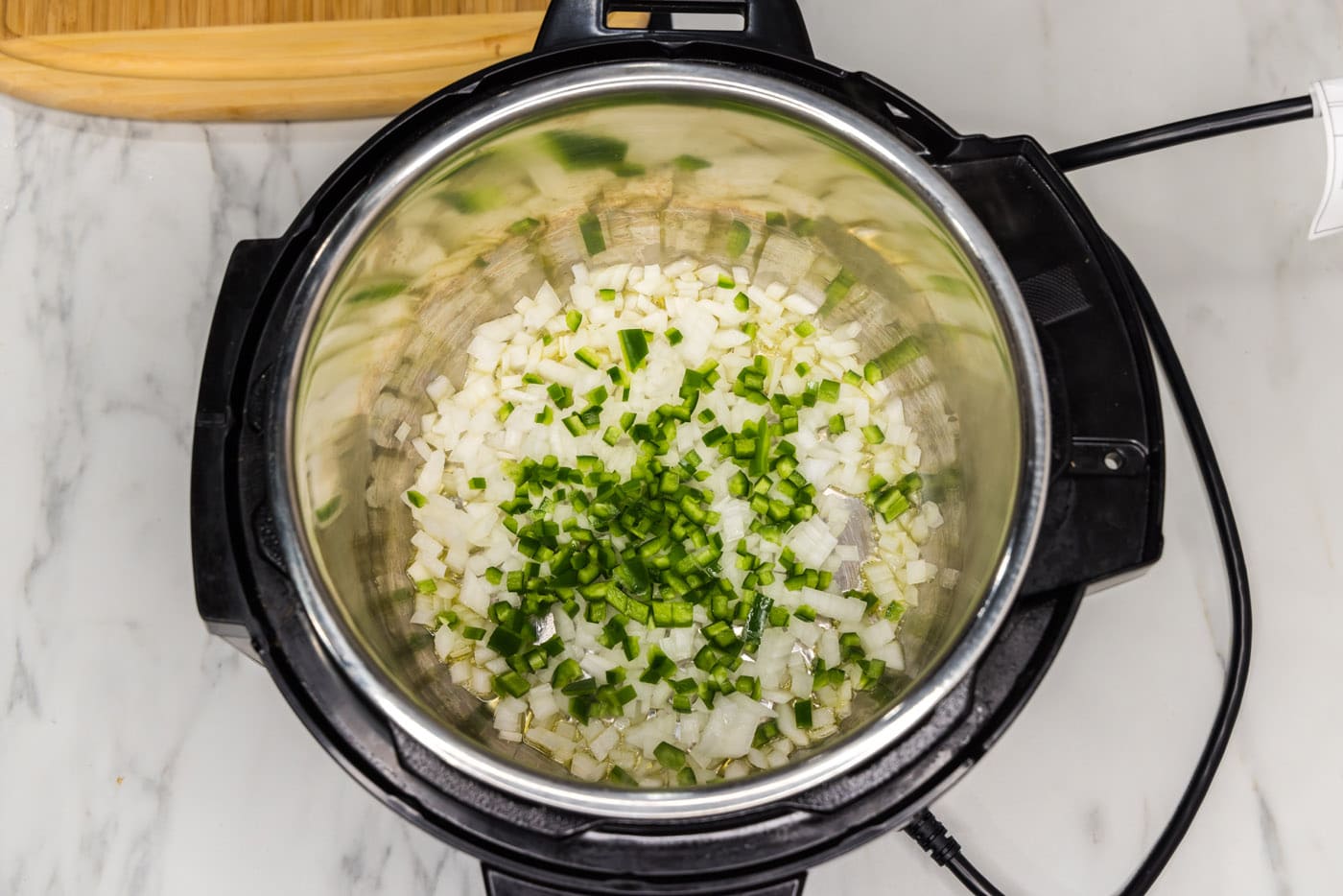 sauteeing jalapeno and onion in an instant pot