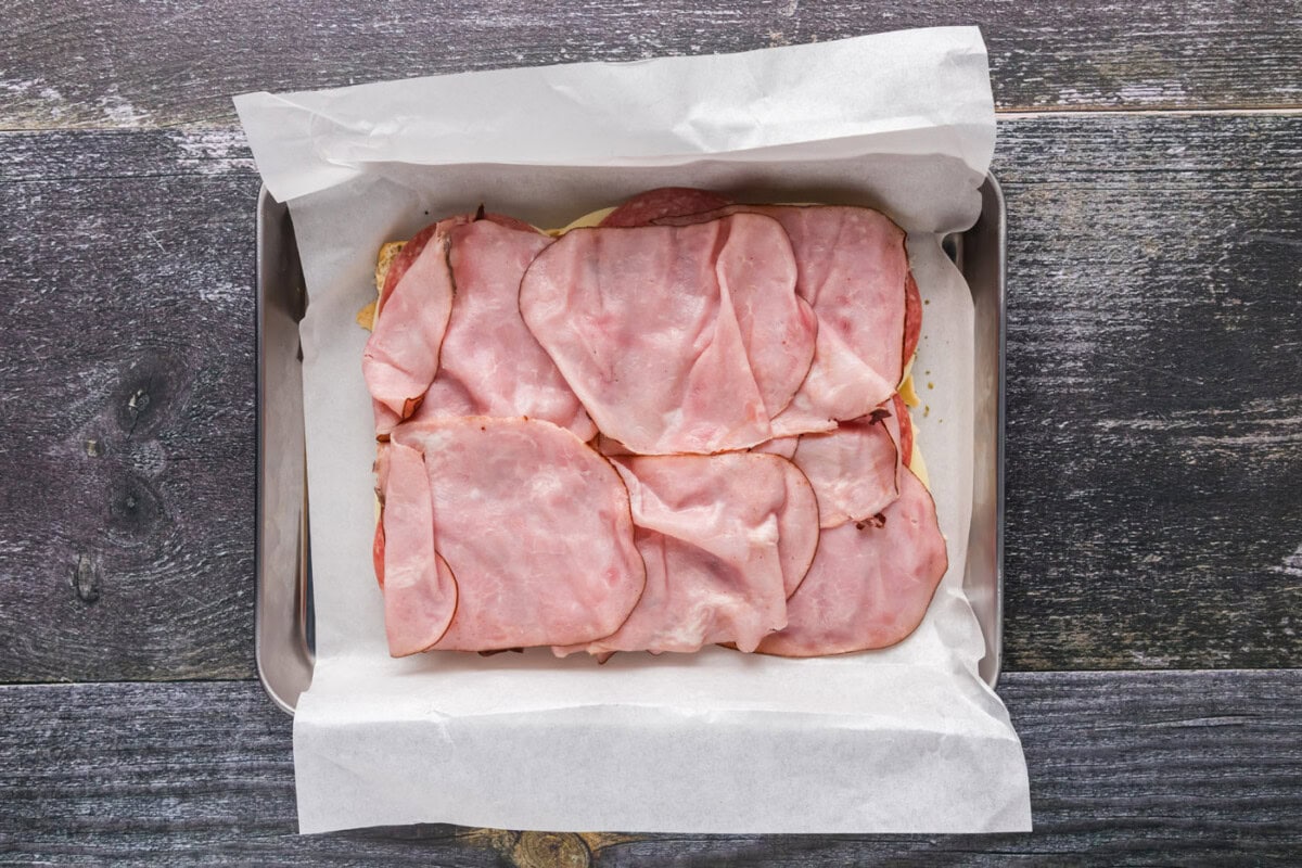 deli ham layered over salami and provolone cheese