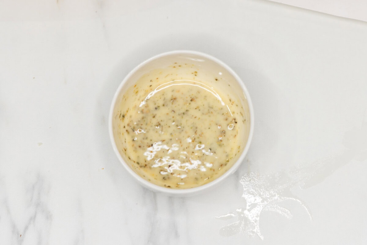 melted butter and seasoning mixture in a bowl