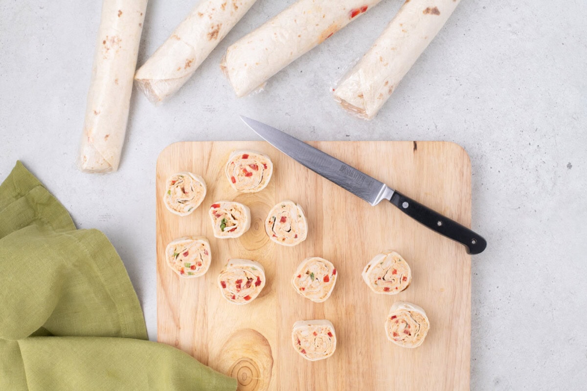 sliced Mexican pinwheels on a cutting board