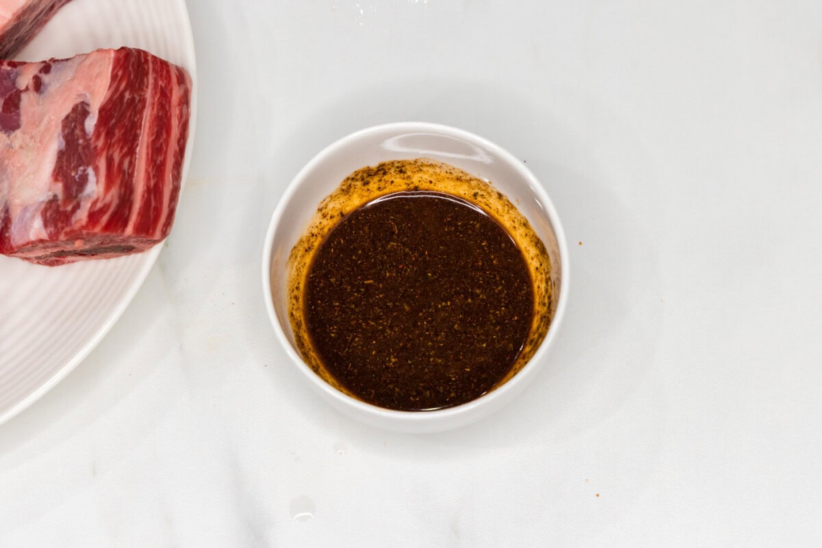 Olive oil and Mexican seasoning in a bowl