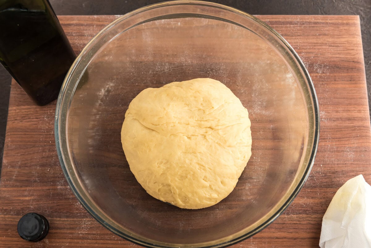 yeast dough ball in a bowl