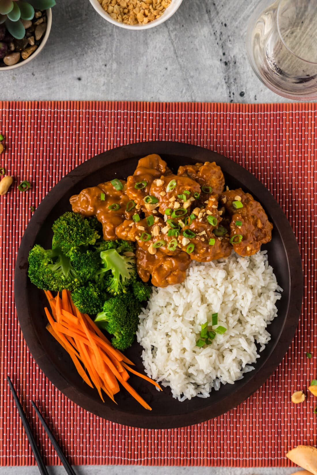 Plate of Peanut Butter Chicken with rice and vegetables