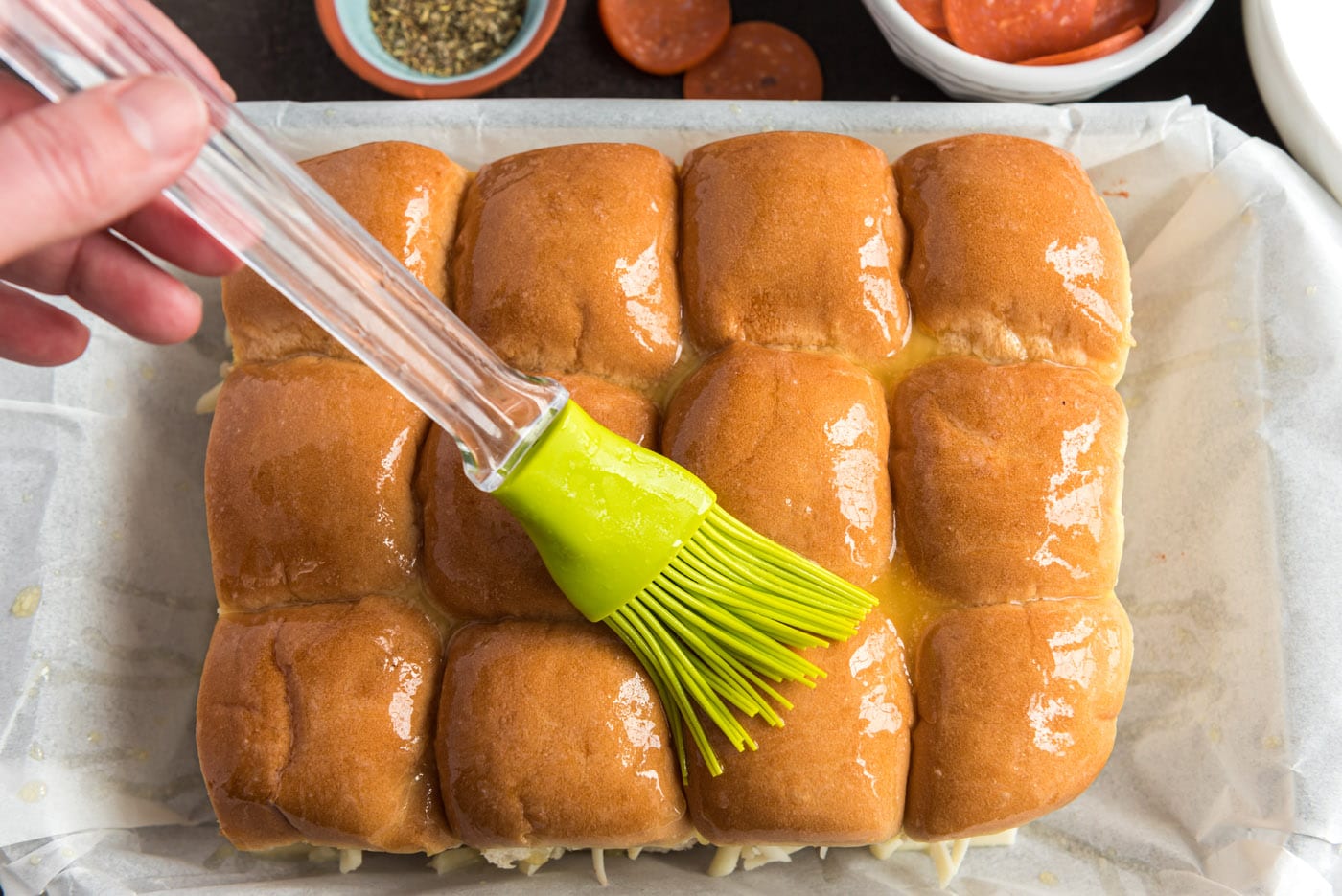 basting slider buns with butter