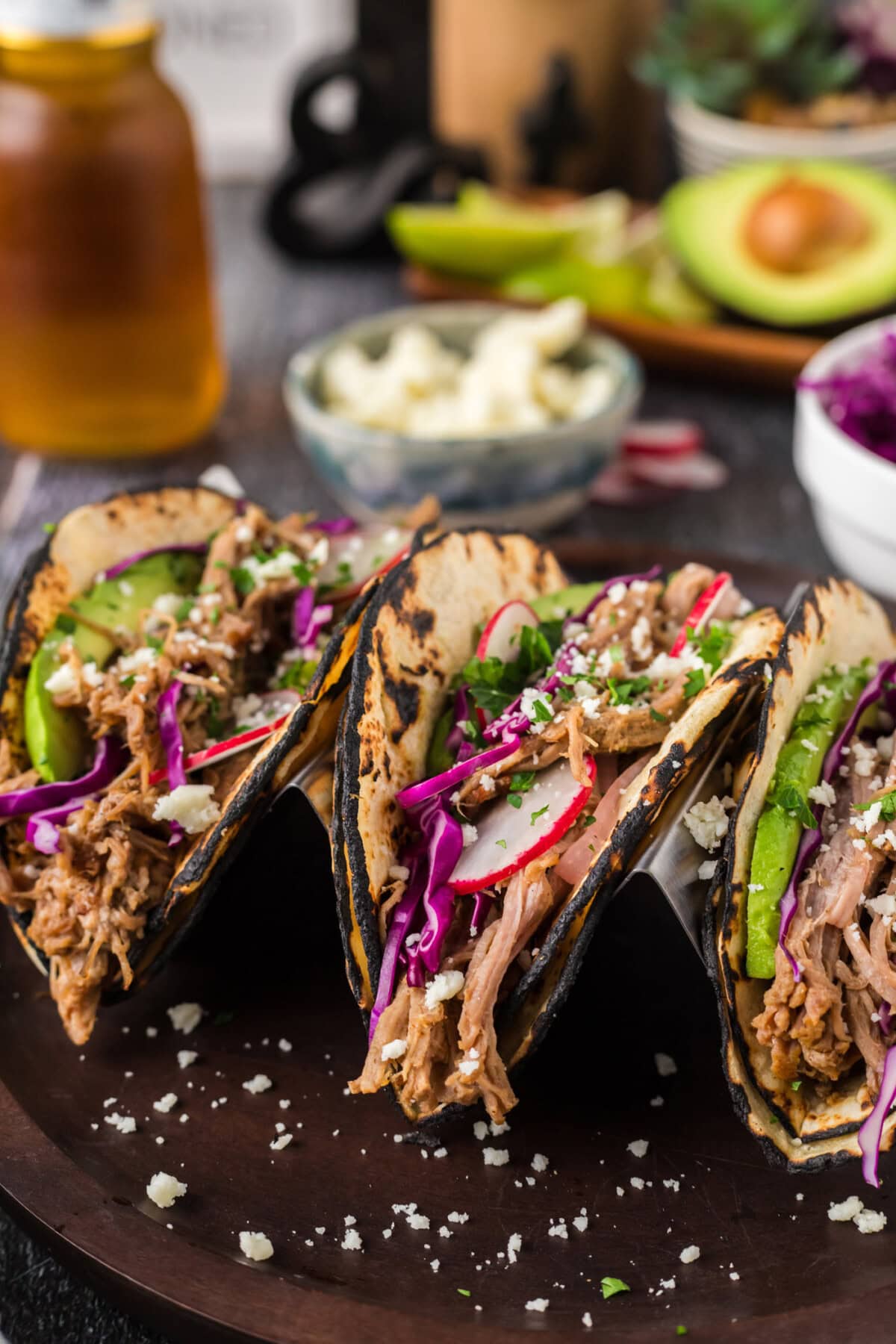 Close up photo of three Pulled Pork Tacos on a plate