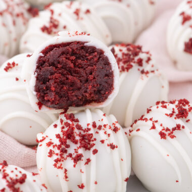 Close up photo of Red Velvet Cake Balls with one cut in half