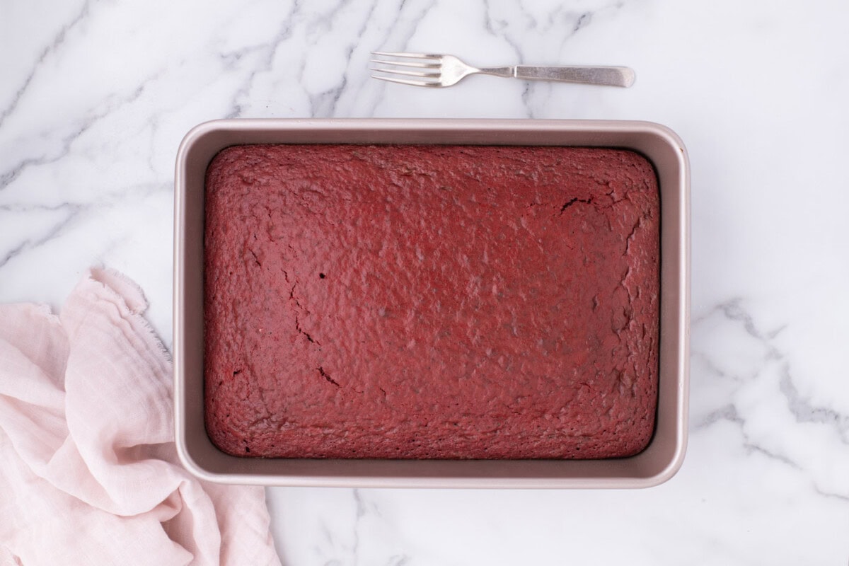 baked red velvet cake in a pan