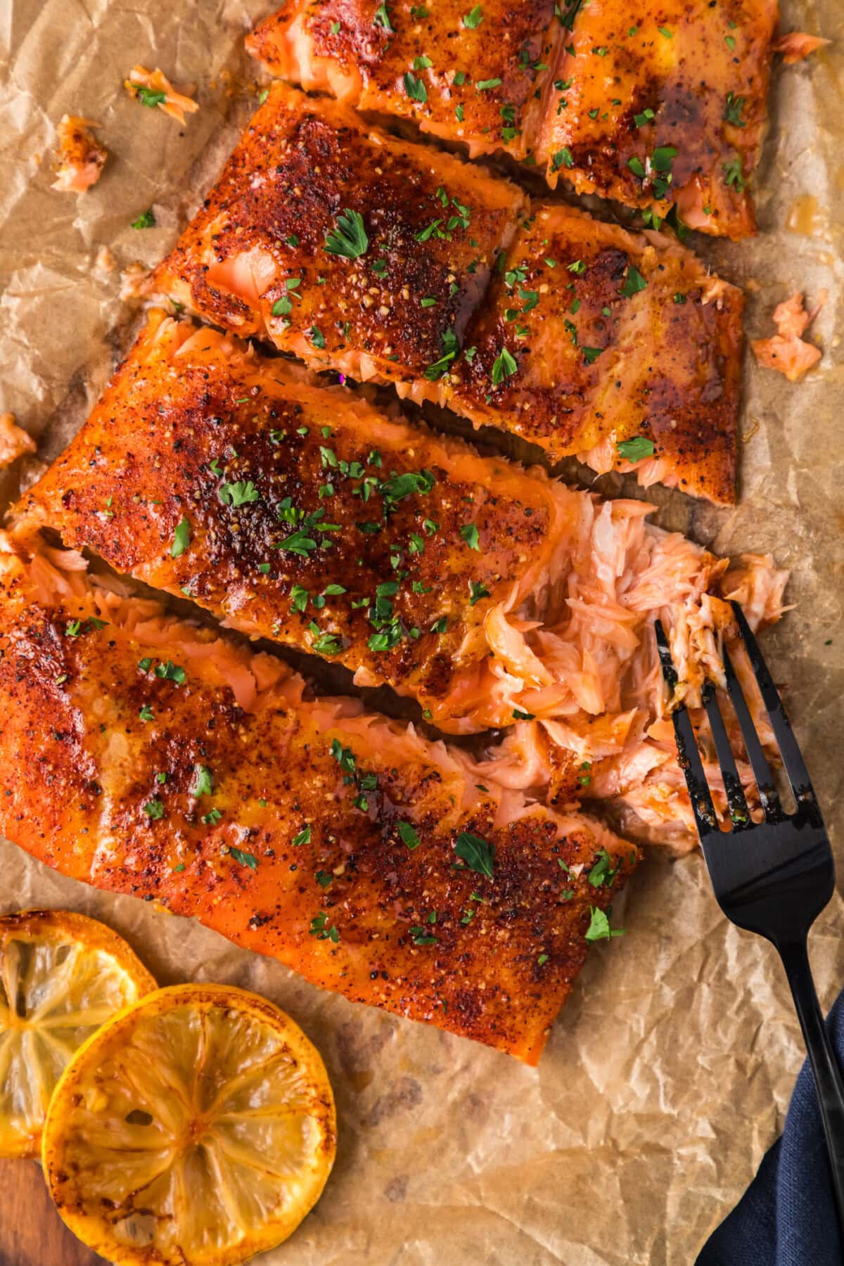 Fork pulling apart a filet of Smoked Salmon