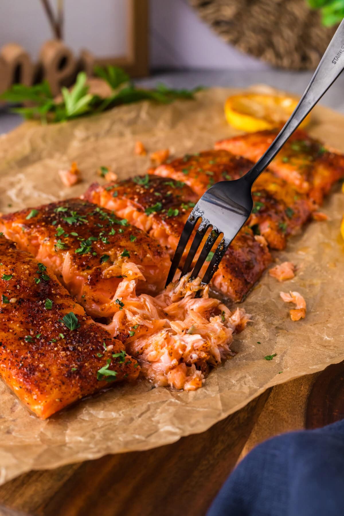 Fork pulling apart Smoked Salmon