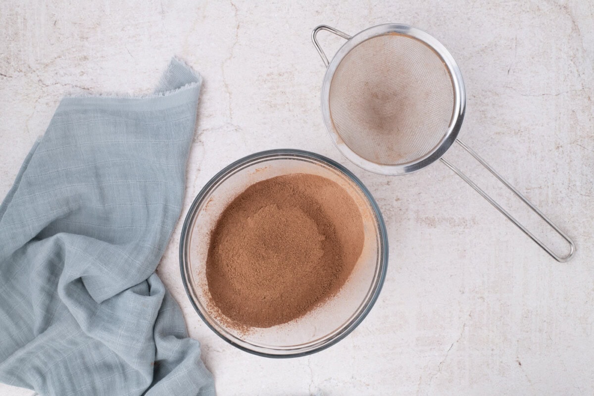 sifted flour and cocoa powder in a mixing bowl