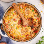 Stuffed Pepper Casserole in a dutch oven with a spoon