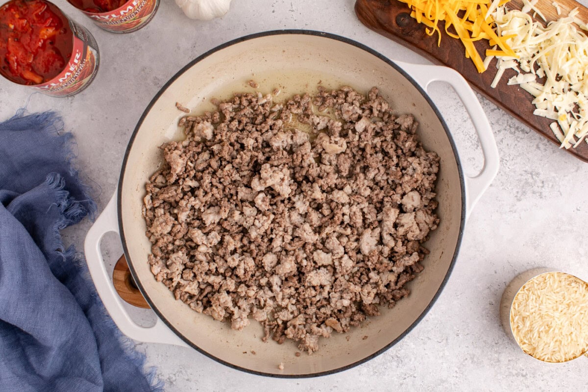 ground beef and sausage in a skillet