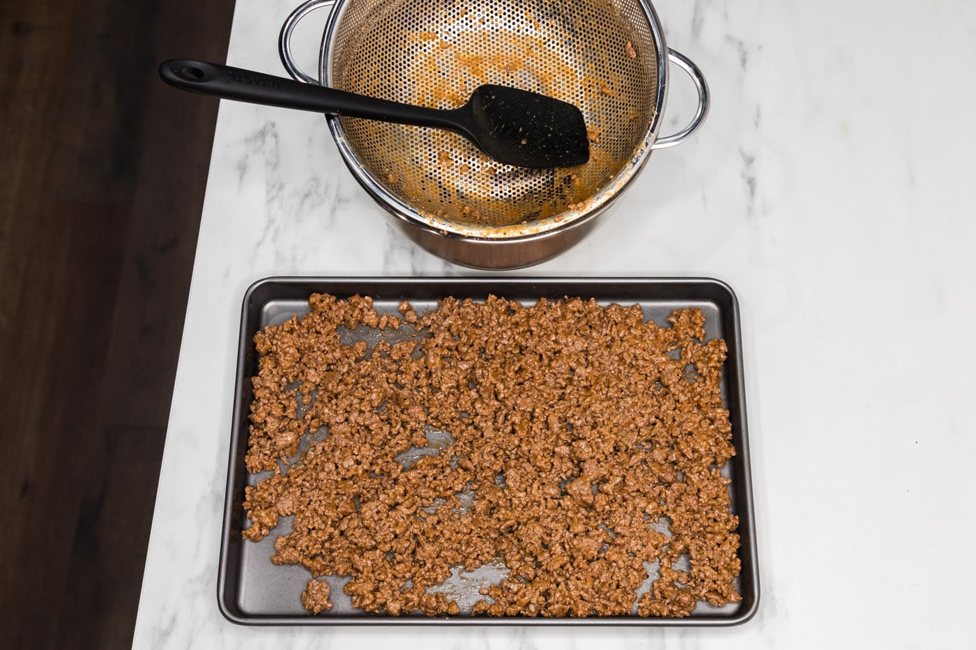 transferring ground beef mixture to a baking sheet