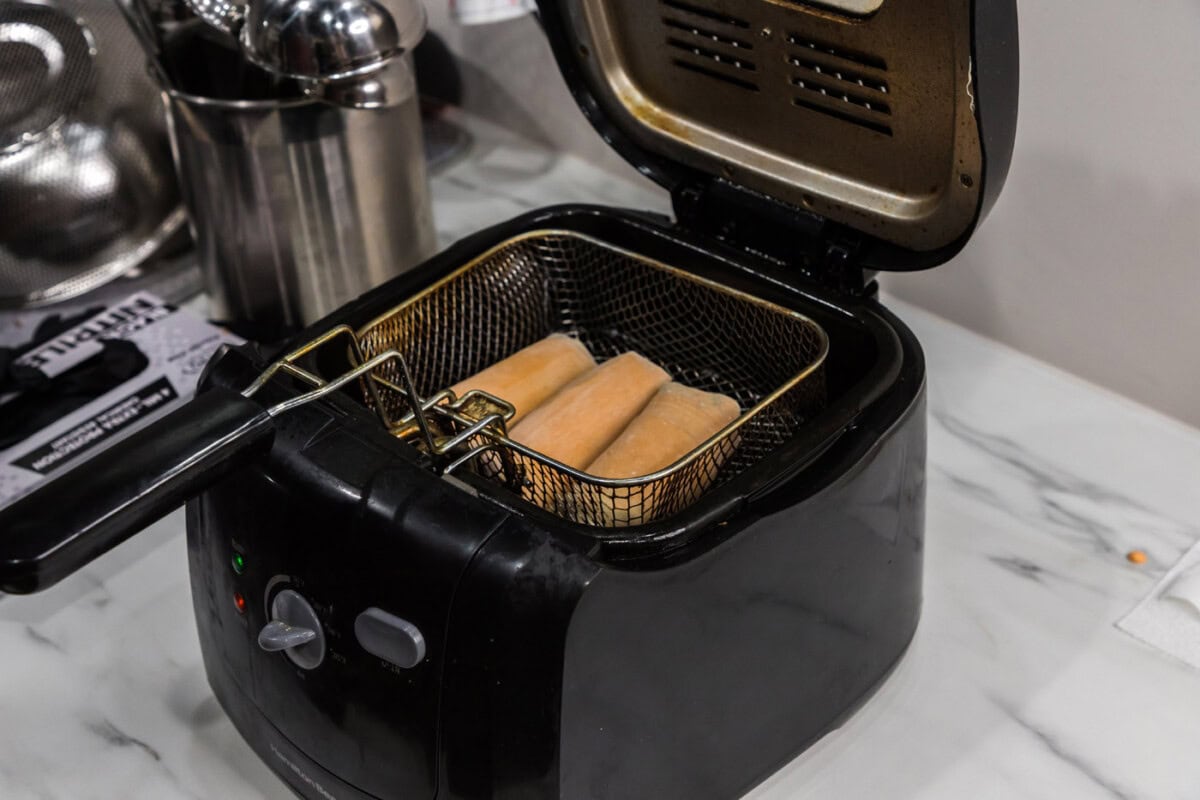 deep frying egg in rolls