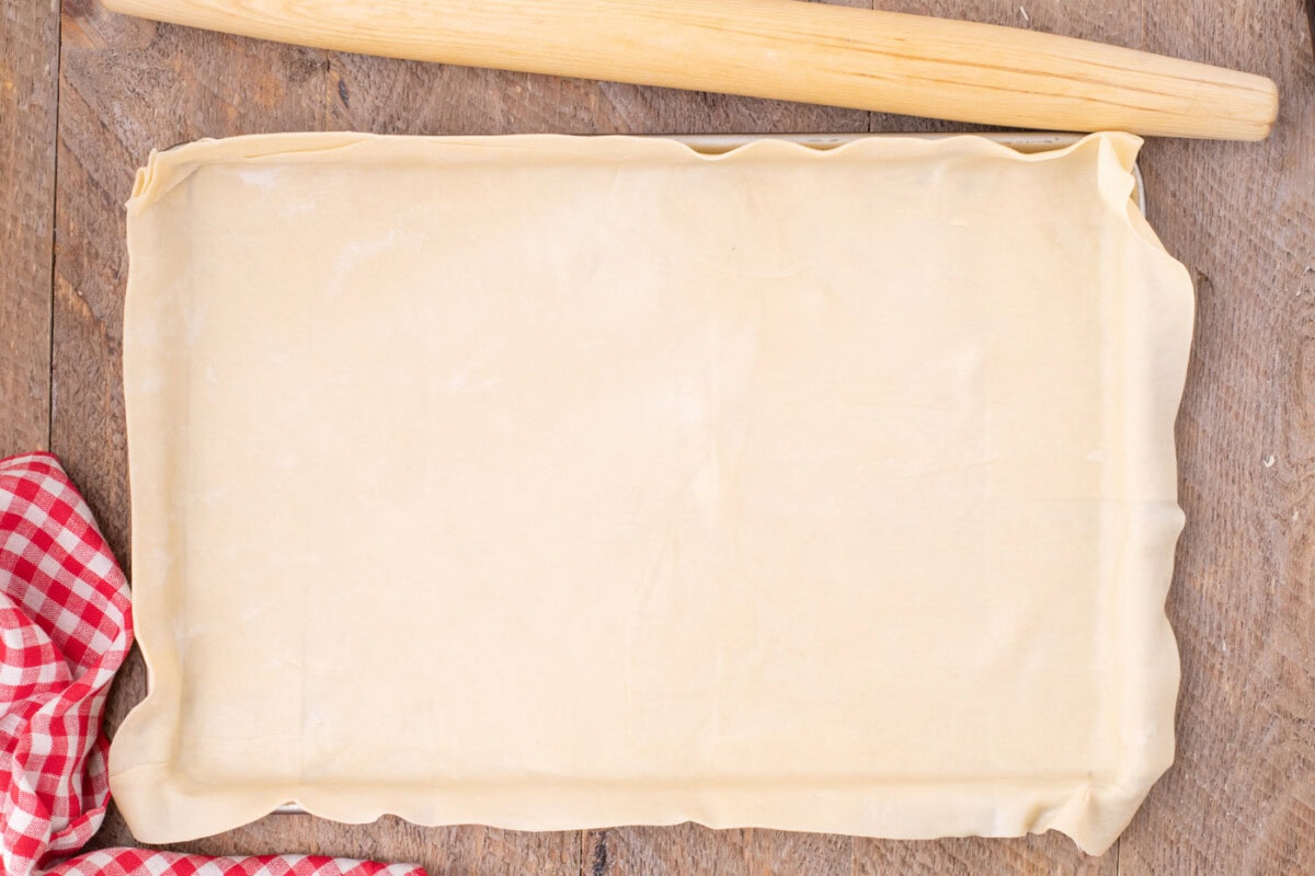 pie crust placed in a jelly roll pan