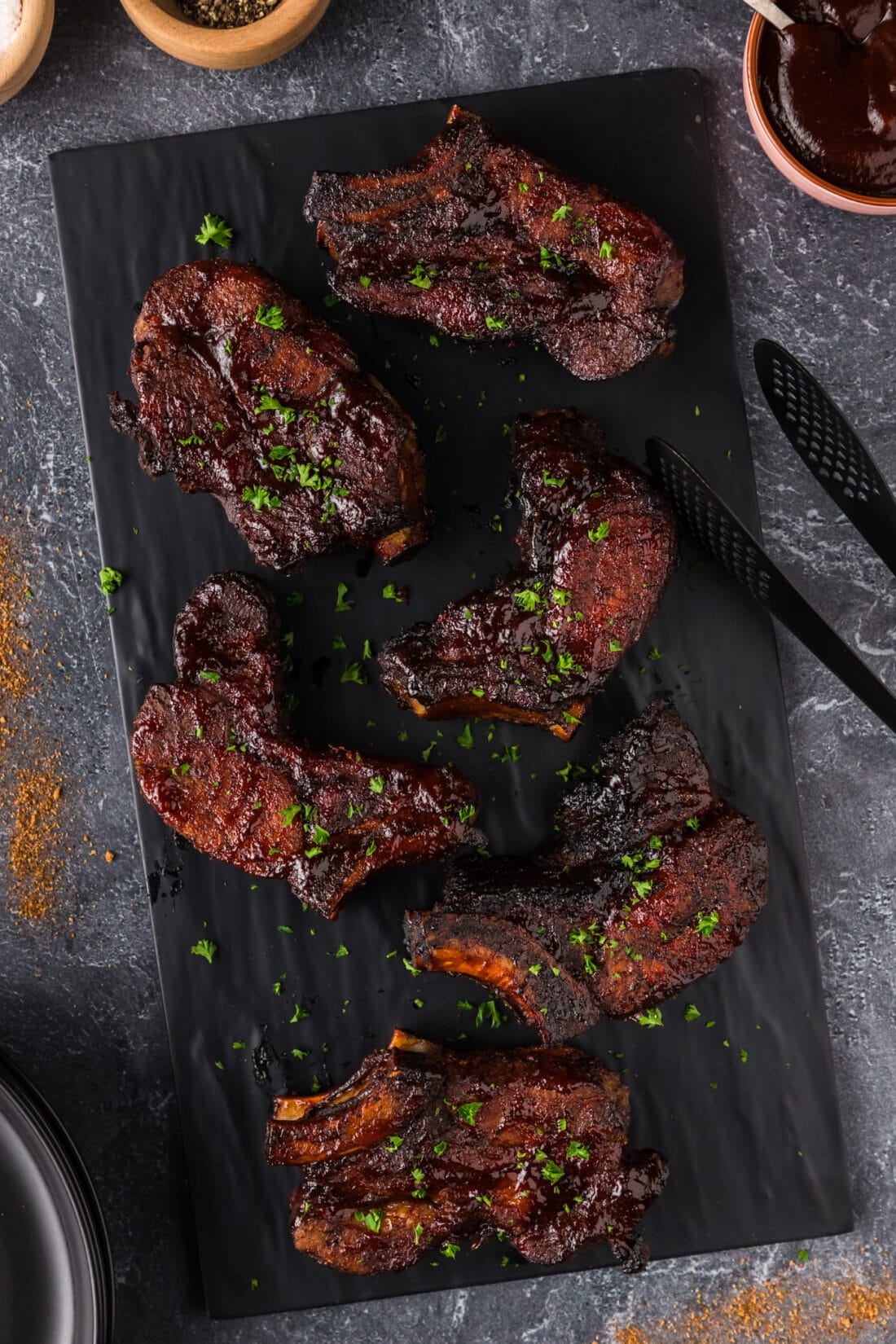 Country Style Ribs on a black platter 