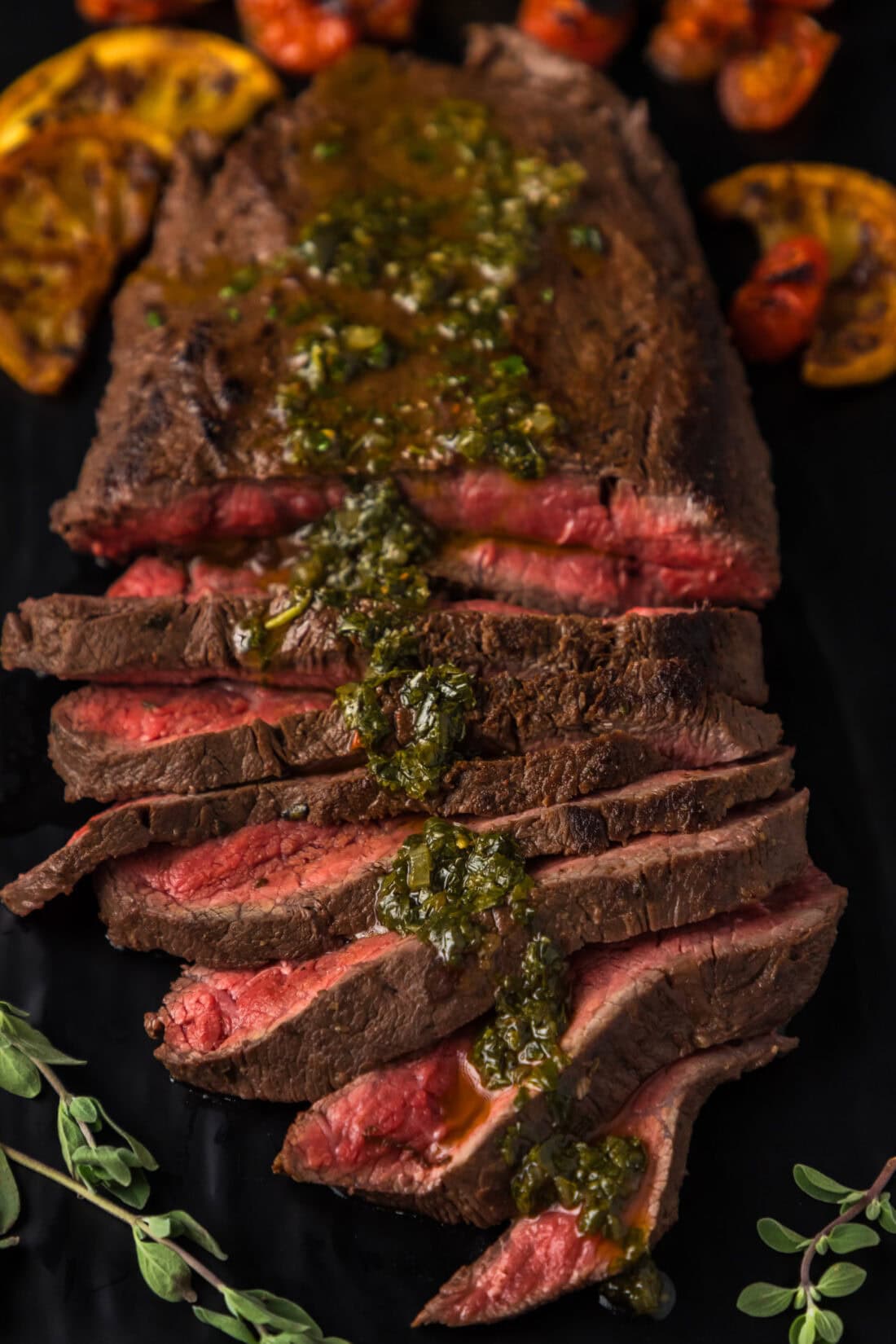 Sliced Flat Iron Steak topped with Chimichurri