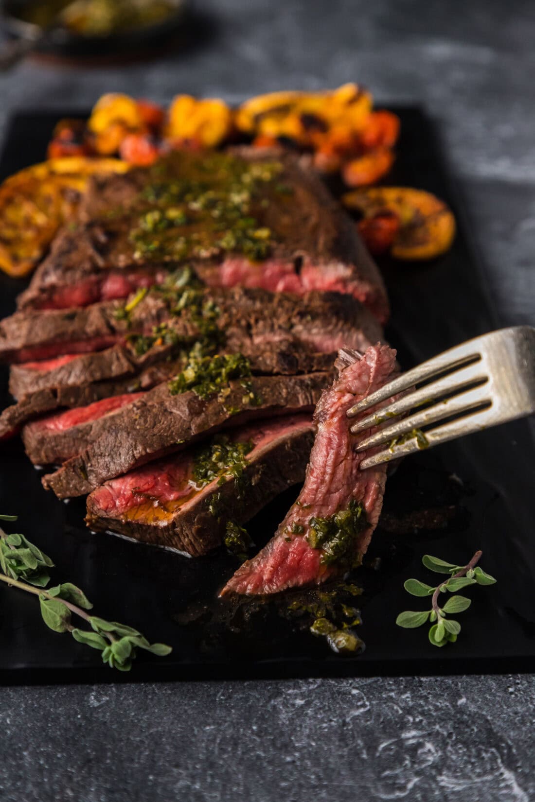 Piece of Flat Iron Steak on a fork