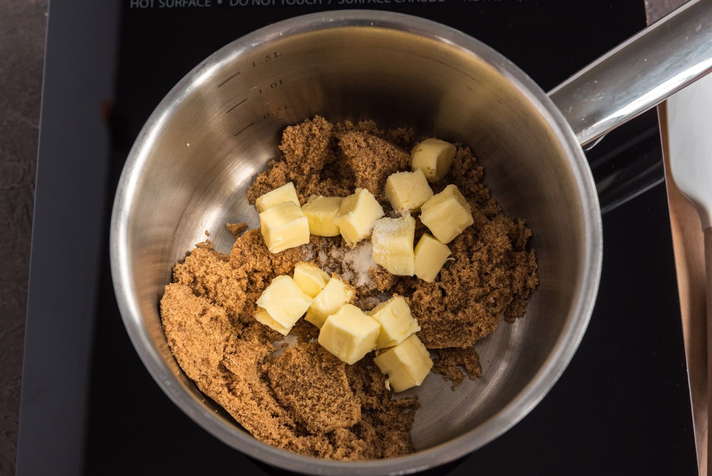 cubed butter and brown sugar in a saucepan