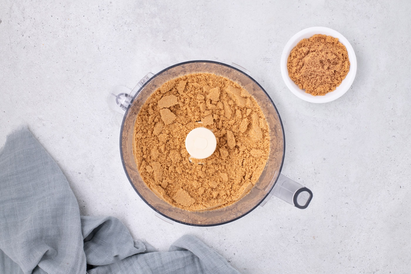 nutter butter cookie crumbles in a food processor