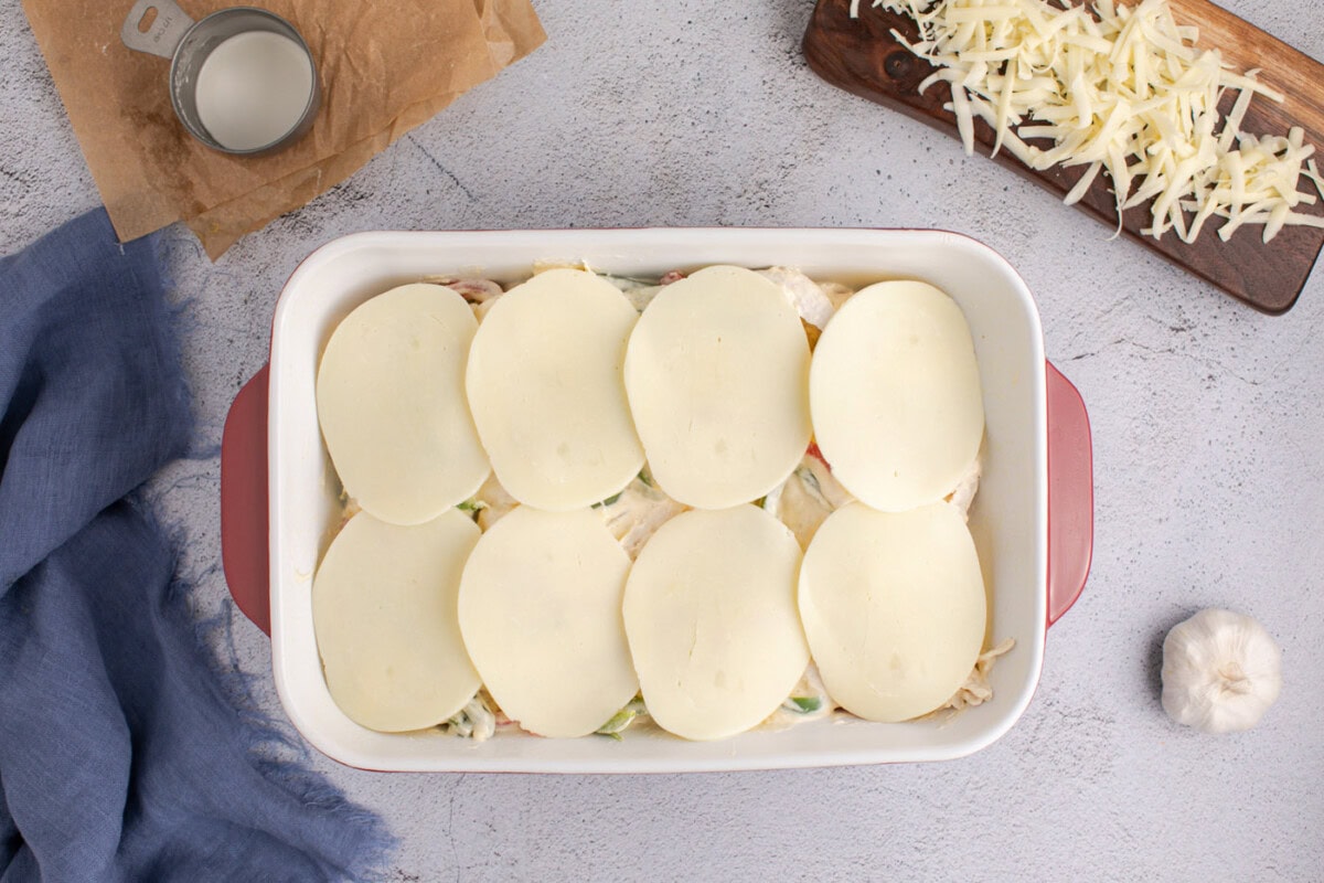 provolone cheese on top of chicken philly cheesesteak casserole