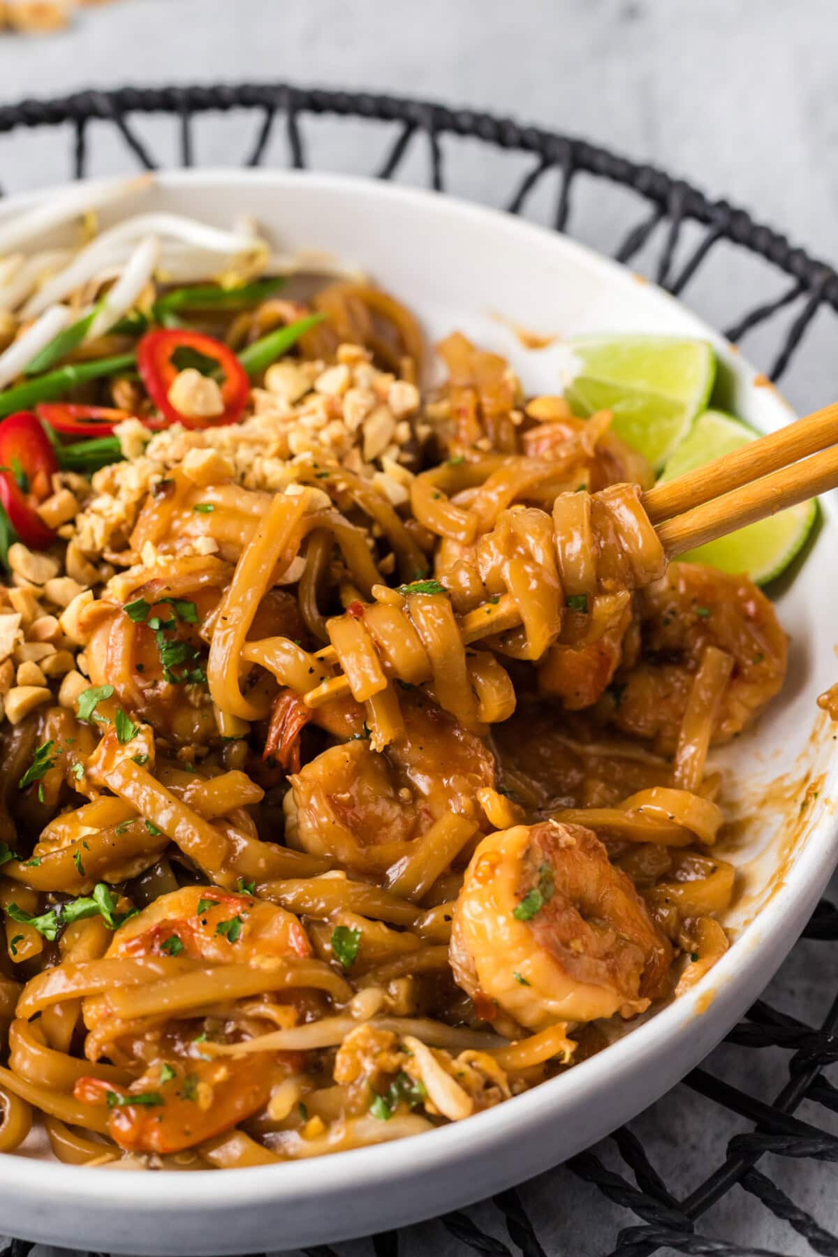Pad Thai noodles wrapped around chopsticks