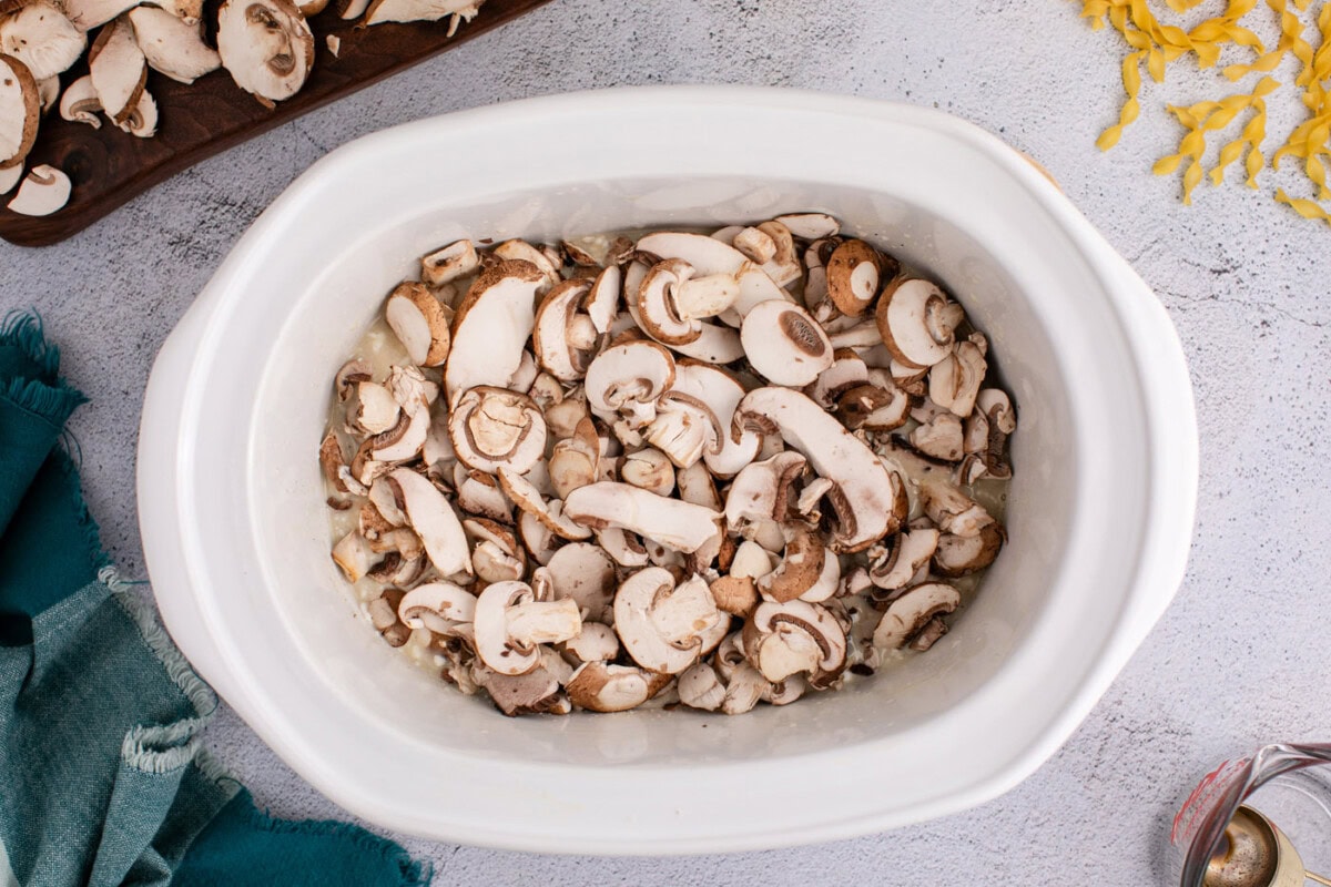 sliced mushrooms added to crockpot chicken stroganoff