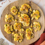 Close up photo of a plate of Smashed Cauliflower