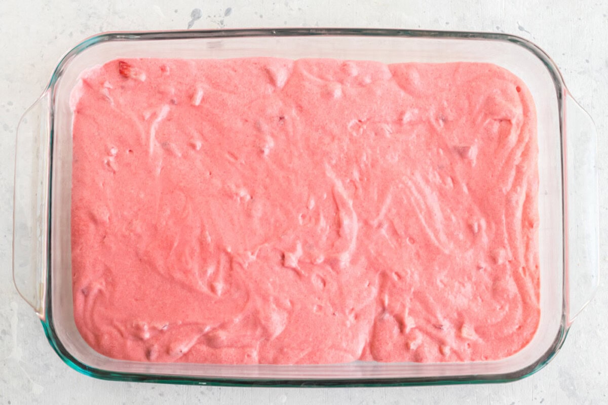 Strawberry Cake batter in a 13x9 pan
