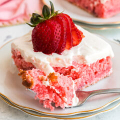 slice of strawberry cake with a fork