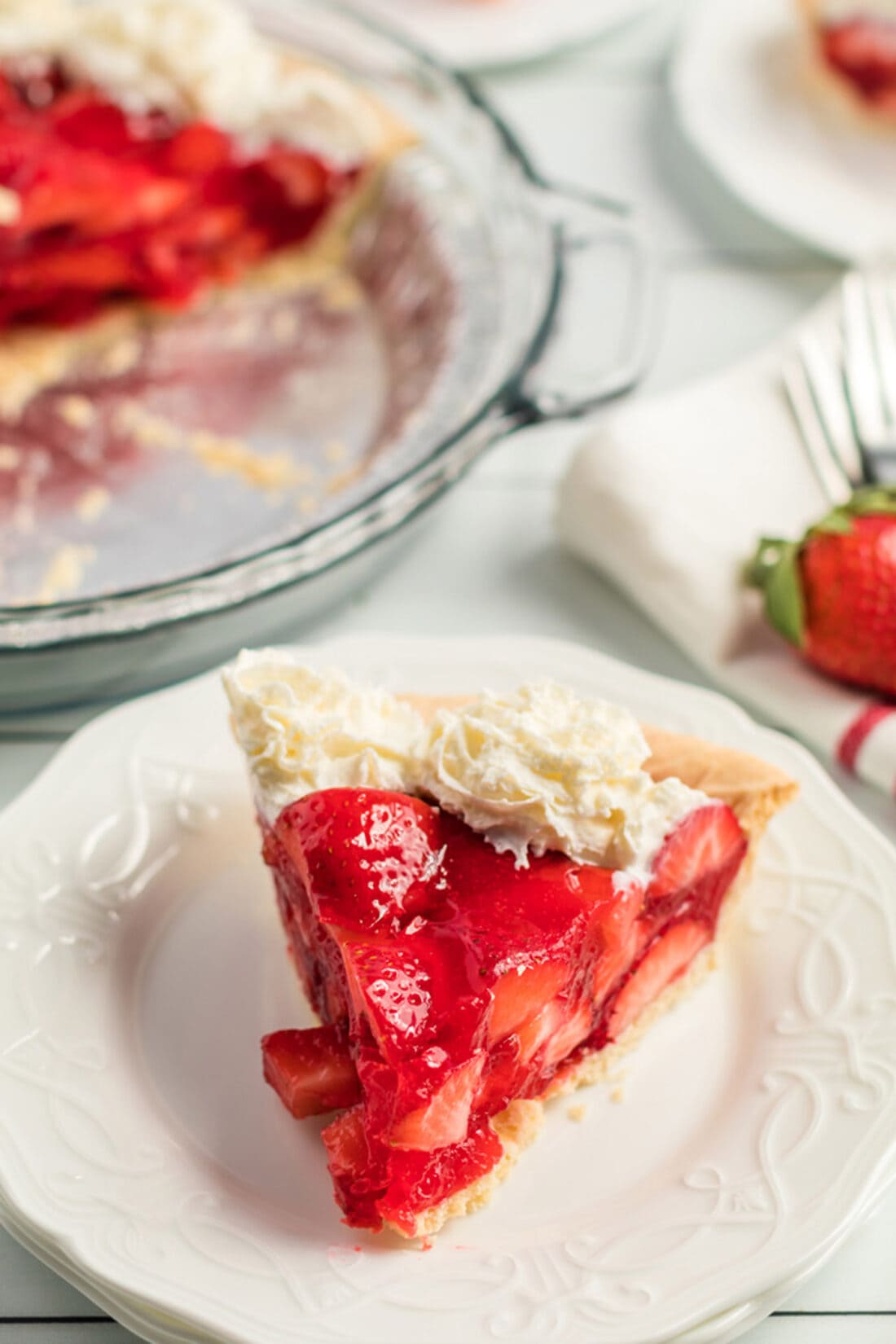 single slice of strawberry pie on a plate
