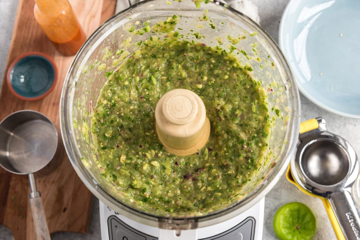 blitzed tomatillo avocado salsa in a food processor