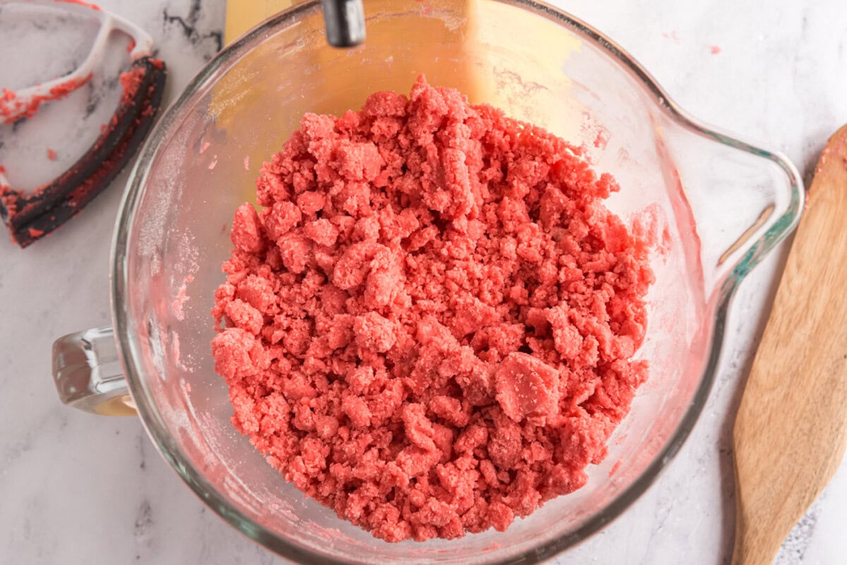 watermelon cookie dough in a mixer bowl