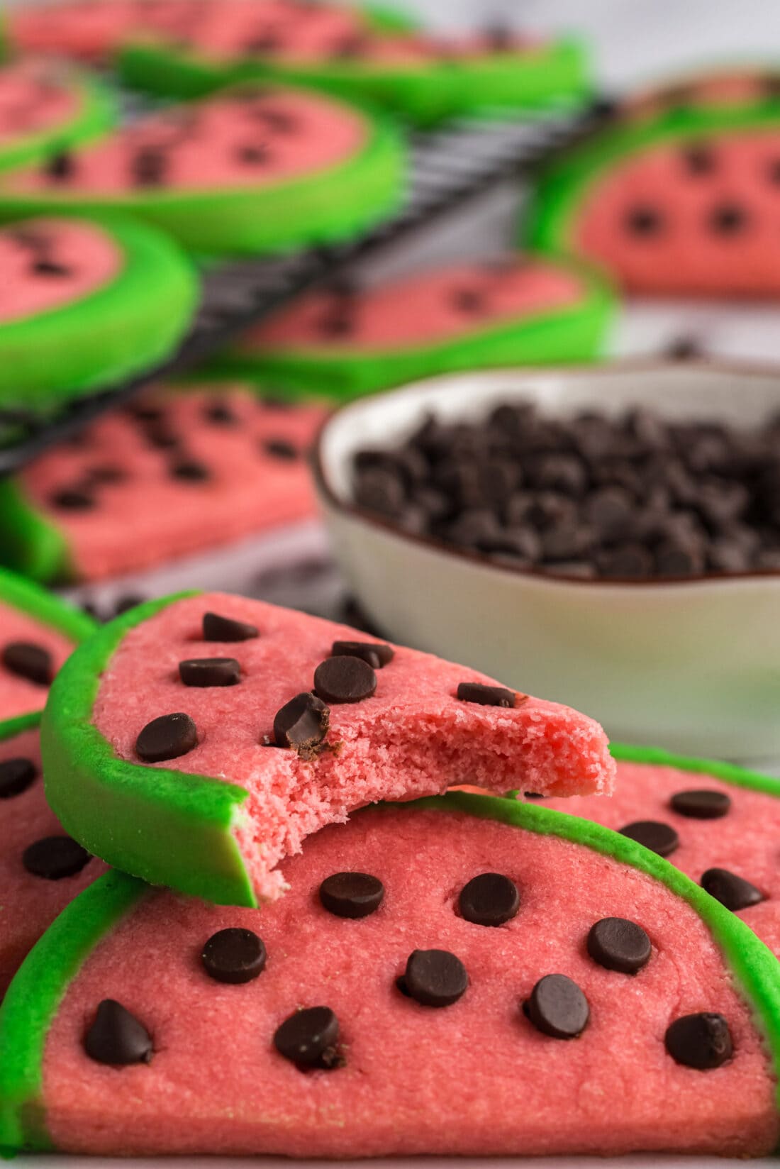 Close up photo of a Watermelon Cookie with a bite taken out