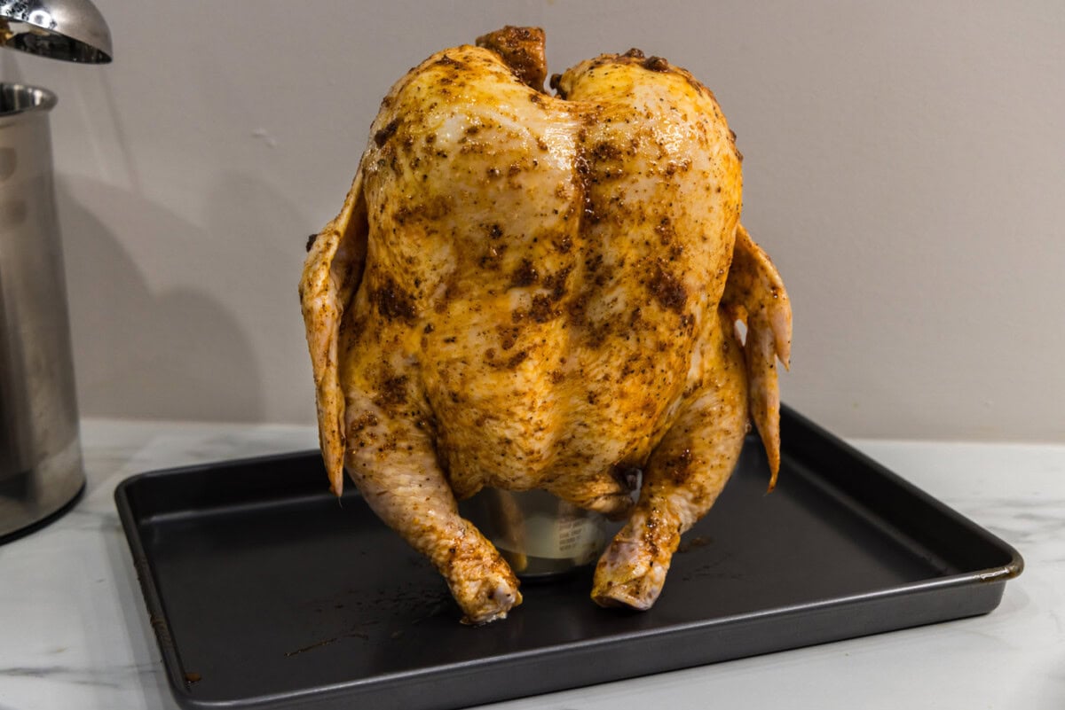 whole chicken on top of a beer can