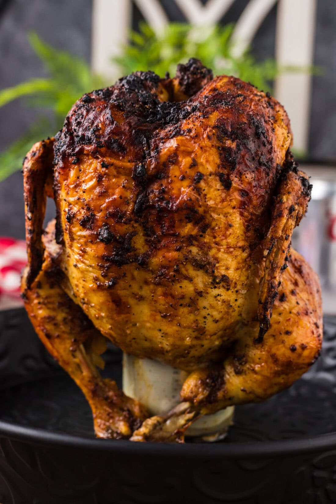 Close up image of a Beer Can Chicken on a metal tray