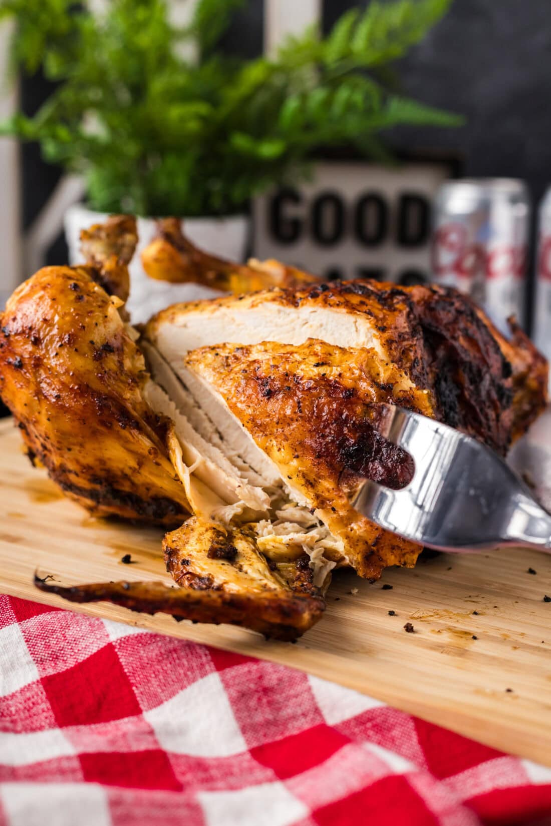 Piece of Beer Can Chicken being removed by a meat fork