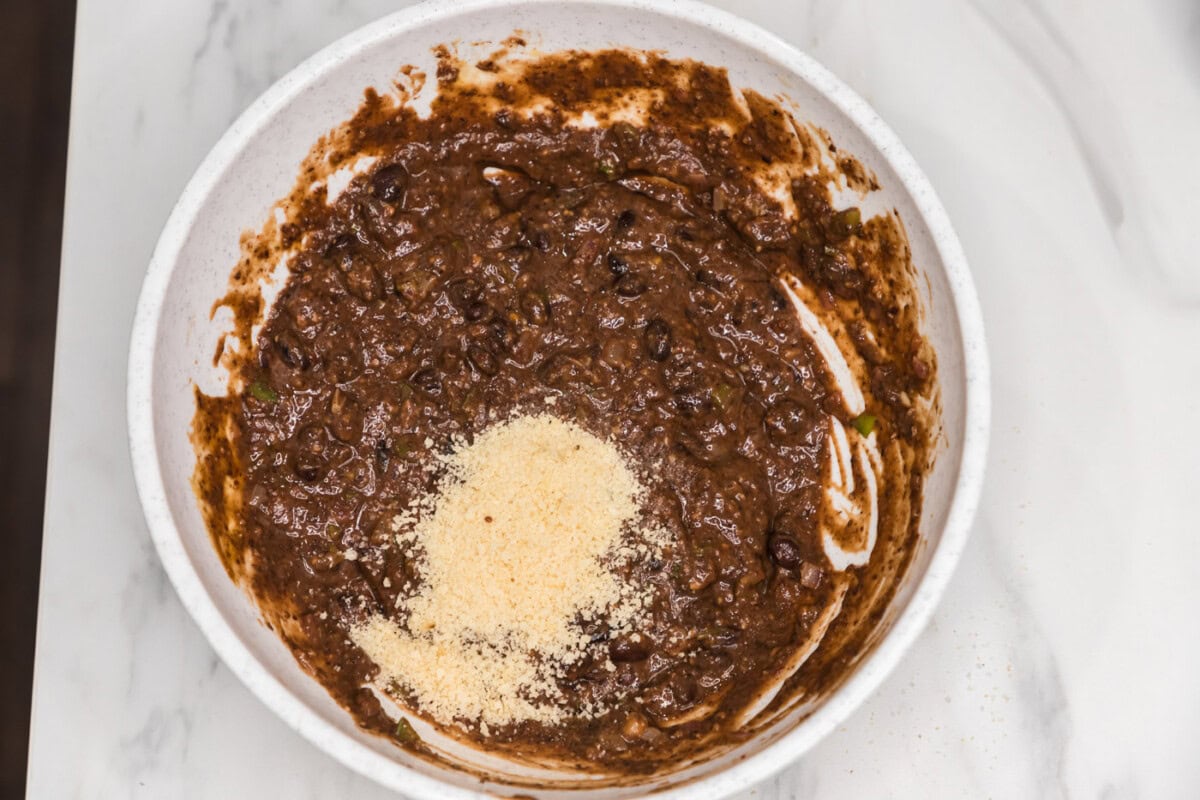 breadcrumbs added to bowl with black bean mixture