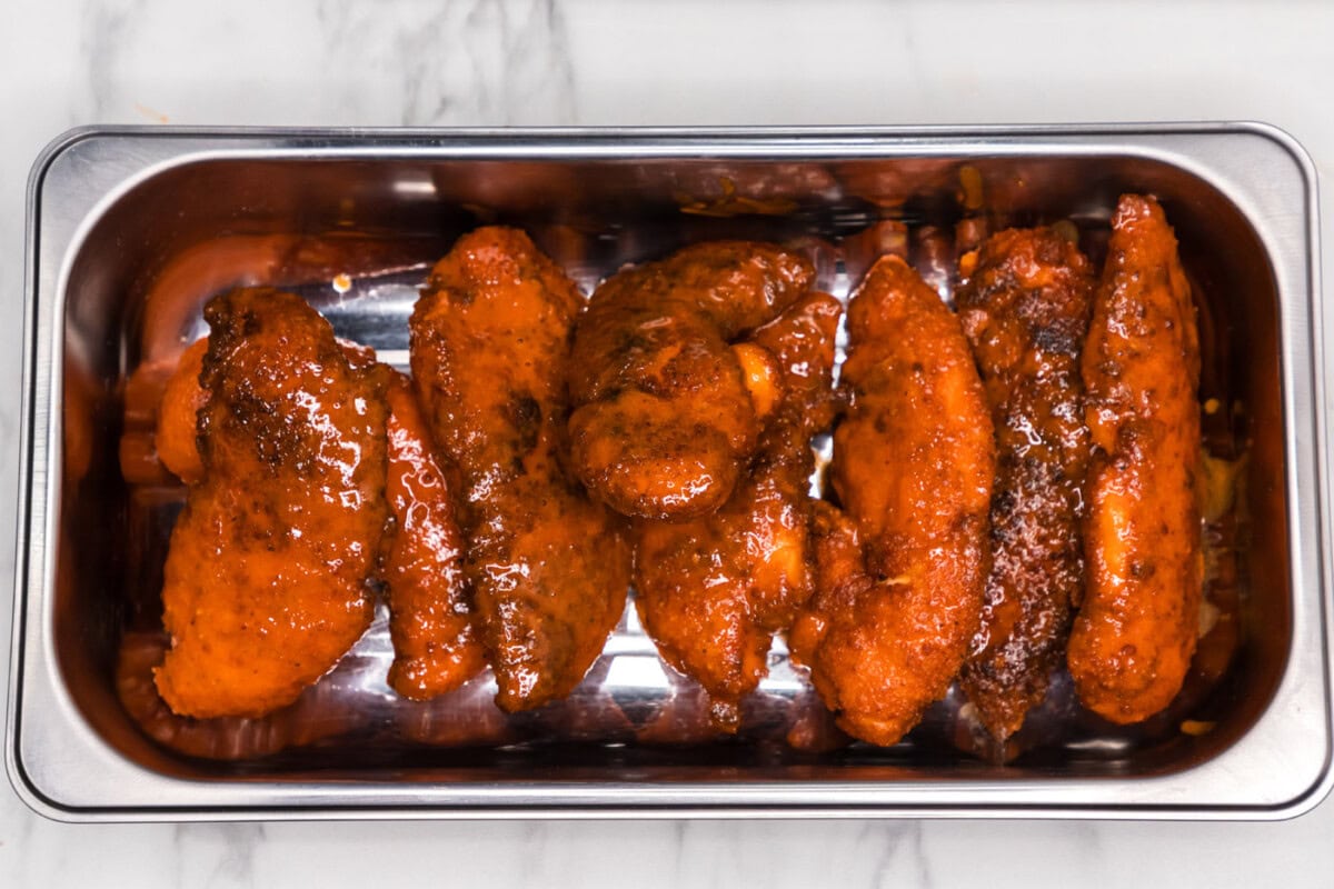 buffalo chicken tenders on a pan