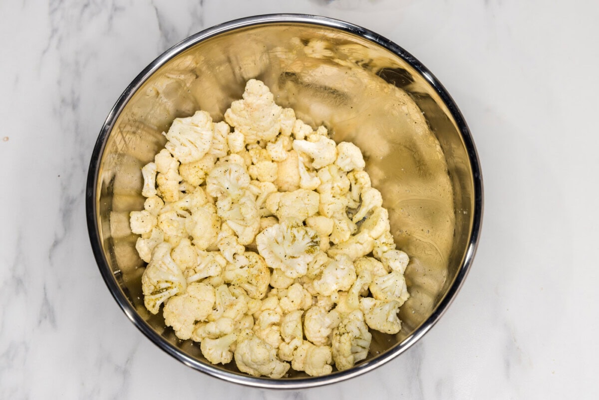 seasoned cauliflower florets in a bowl