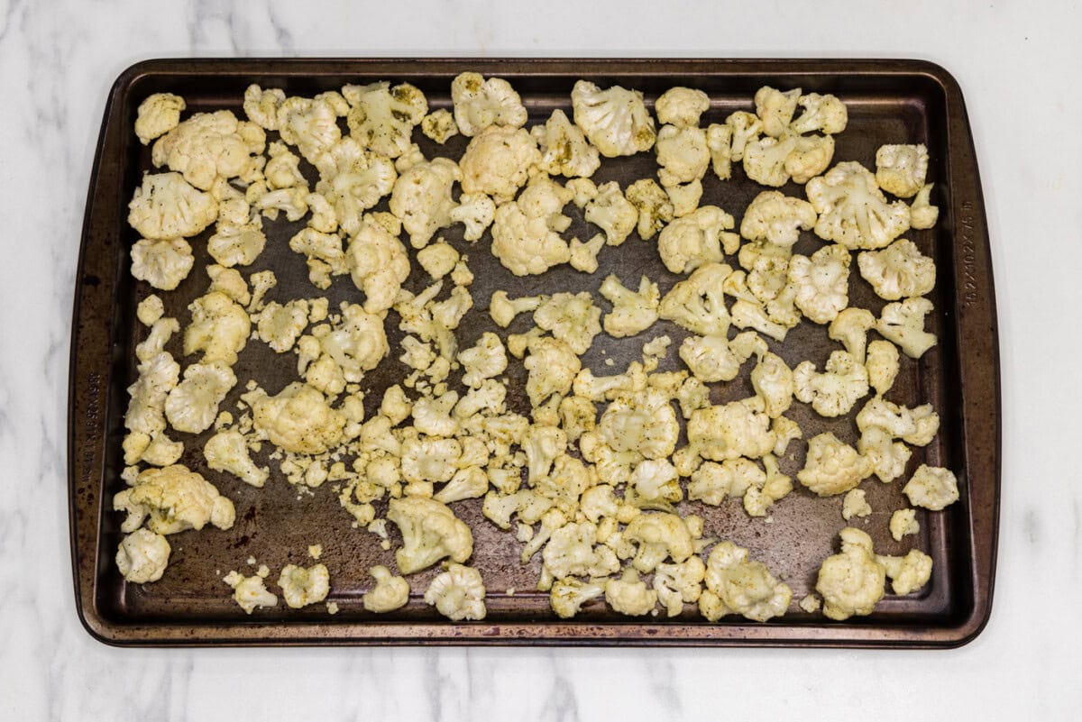 cauliflower florets on a baking sheet
