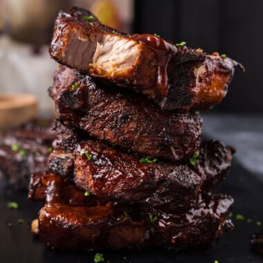 Close up photo of Country Style Ribs on a black platter