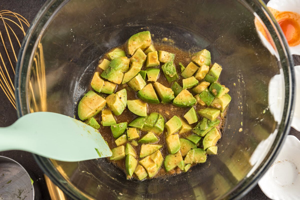 coating avocado in oil and vinegar dressing
