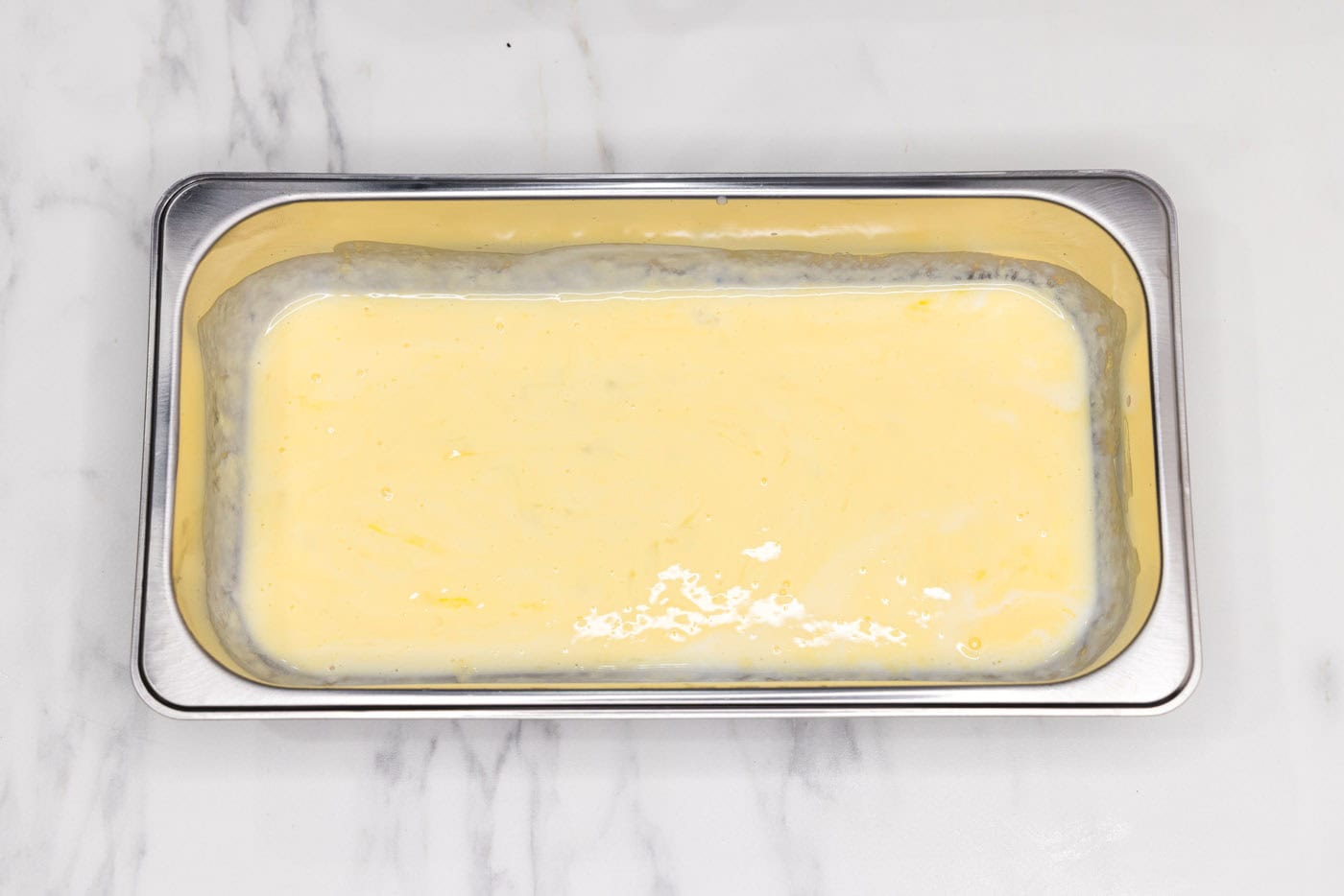 buttermilk and egg mixture in a breading tray