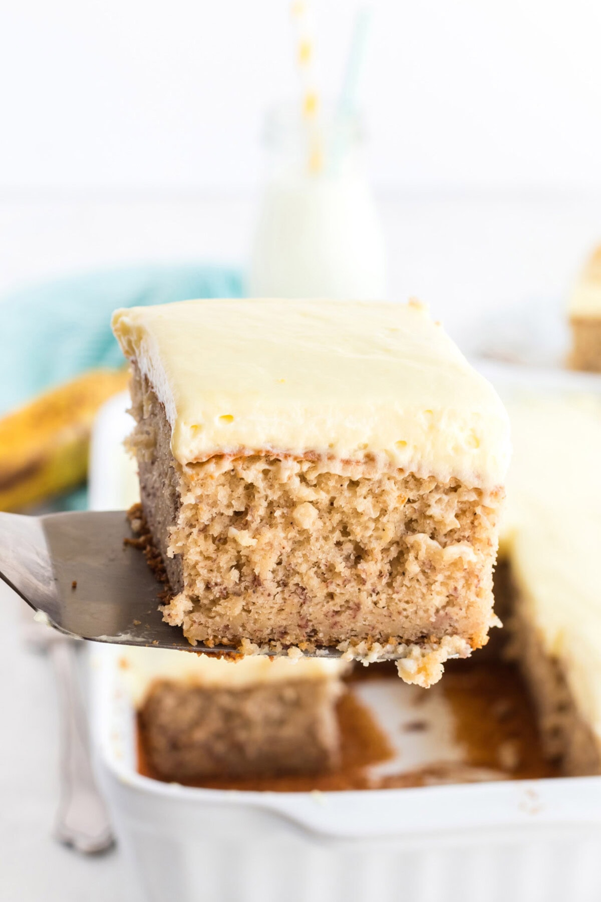 spatula holding a slice of banana cake