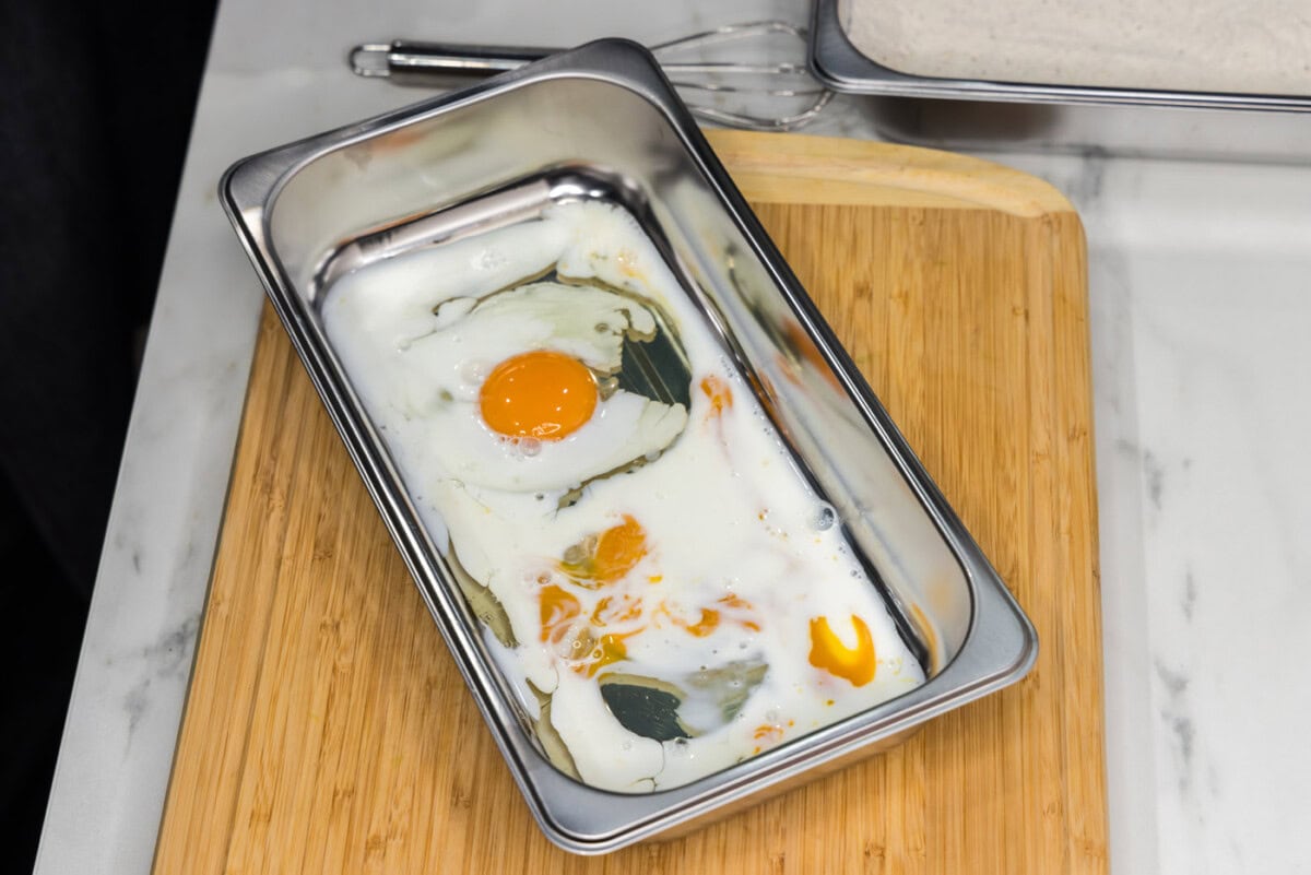 a breading tray with eggs and buttermilk